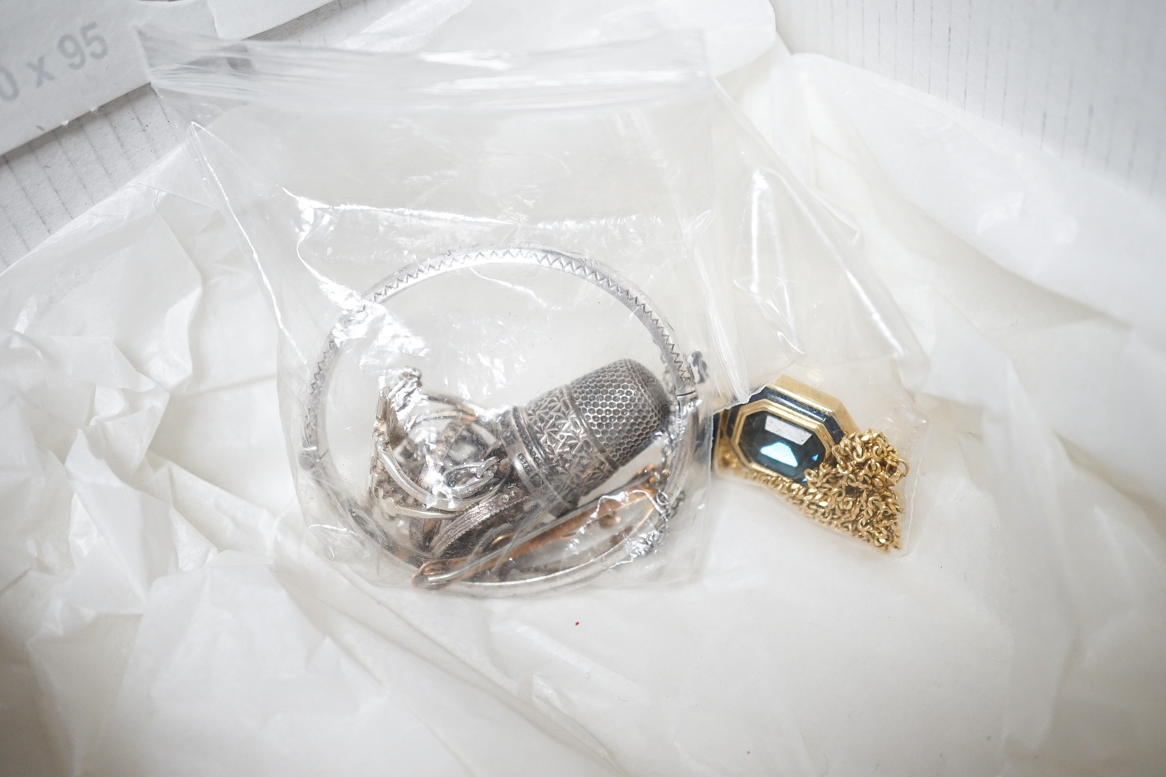 A box of mixed costume jewellery.